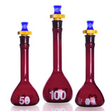 26929. MATRAZ VOLUMETRICO DE VIDRIO 20ML AMBAR CLASE A RAY-SORB, BOCA ANCHA C/TAPON DE POLIETILENO KIMAX